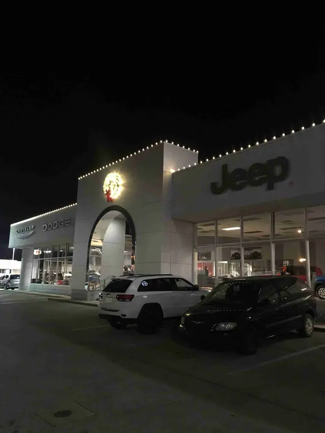 Chrysler Dodge Jeep dealership with Christmas lights and wreath
