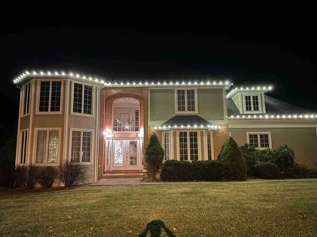 Multi-level home with elegant white Christmas lights